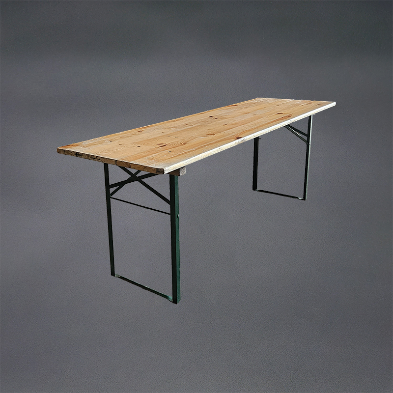 Eight shirts arranged on table in black, olive, grey, blue, white, red, mustard, and green.